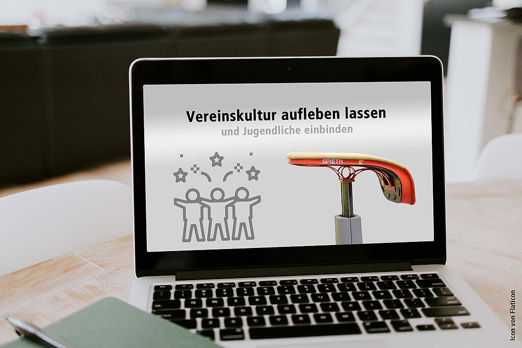 Ein Laptop mit einer Aufschrift zum Online-Sprungtisch.